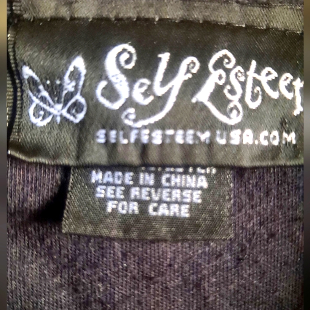 Young women's light fall blazer,self-esteem brand name.Shades of Gray's,brown's.